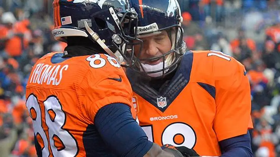 Manning y los Broncos aplastan a los Titanes