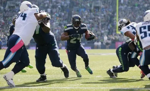 Marshall Lynch, corredor de Seattle, encuentra la zona de anotación | AP