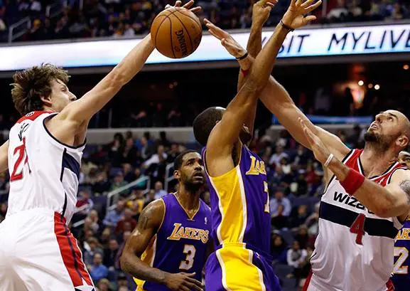 Wall y Nené guían a Wizards al triunfo