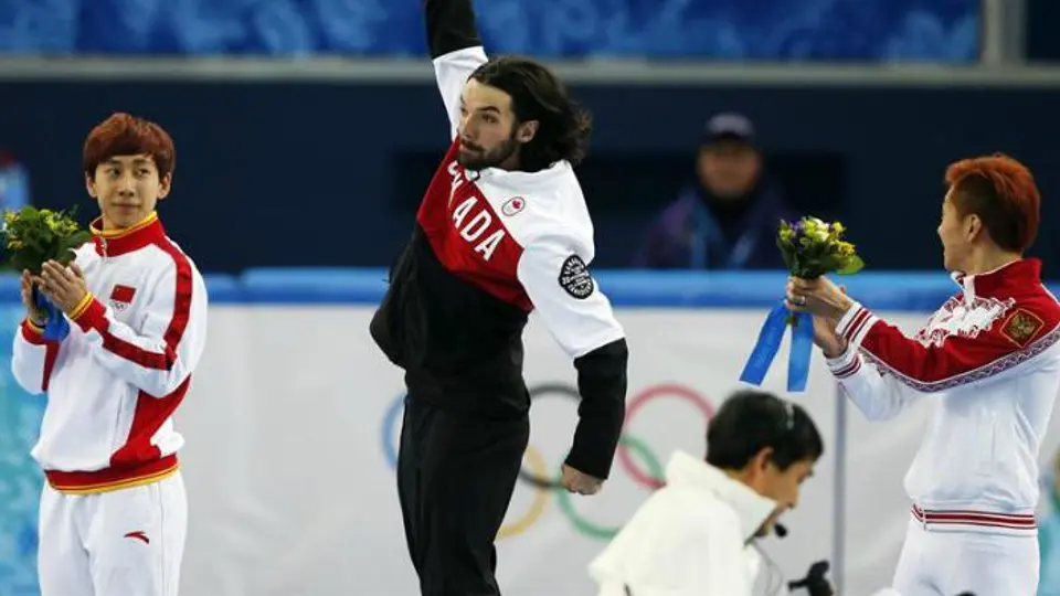 Charles Hamelin gana oro en patinaje de pista corta