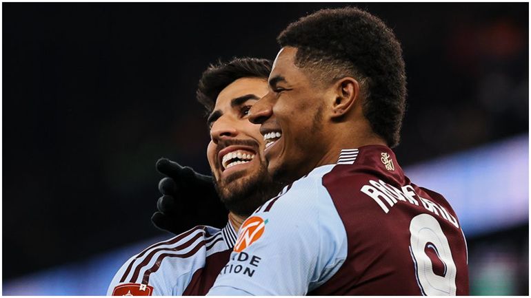 Marcus Rashford and Marco Asensio celebrate after Villa's latest goal.