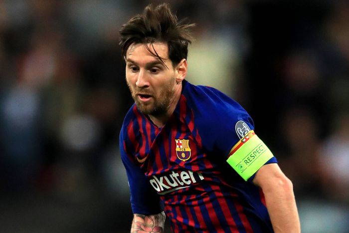 Lionel Messi dribbles the ball during his time at Barcelona.