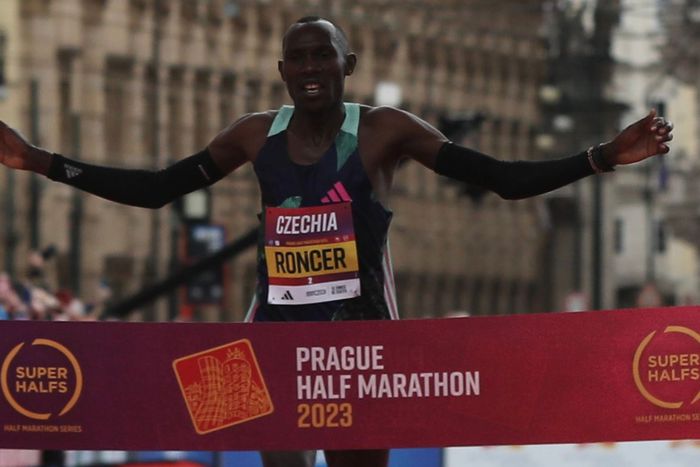 Roncer Kipkorir cuts the tape at the Prague Half Marathon