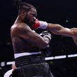 Nose-bleeding Anthony Joshua defeats Jermaine Franklin in 12 round thriller