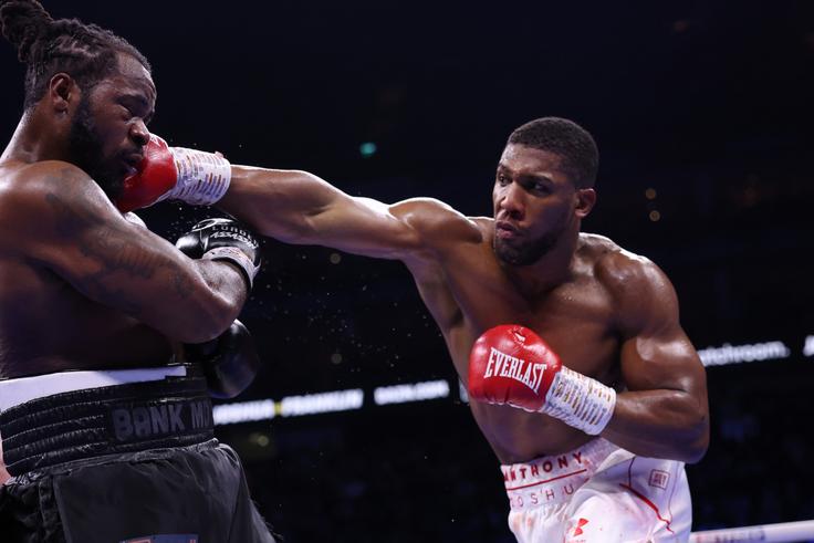 Nose-bleeding Anthony Joshua defeats Jermaine Franklin in 12 round thriller