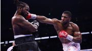 Nose-bleeding Anthony Joshua defeats Jermaine Franklin in 12 round thriller