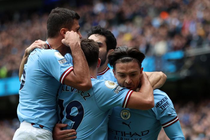Manchester City celebrate a goal against Liverpool at the Etihad.