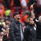 Liverpool manager Jurgen Klopp receives a yellow card