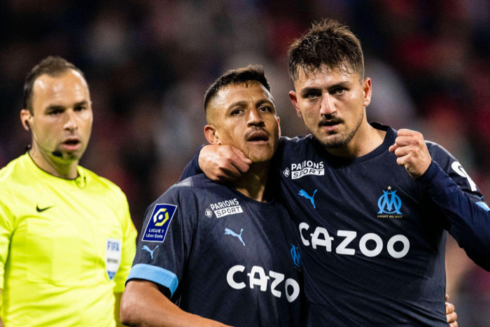 Alexis Sanchez and Cengiz Under celebrate Marseille's win