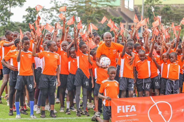 FKF president Nick Mwendwa with young girls during the FIFA/FKF Women’s Football Campaign