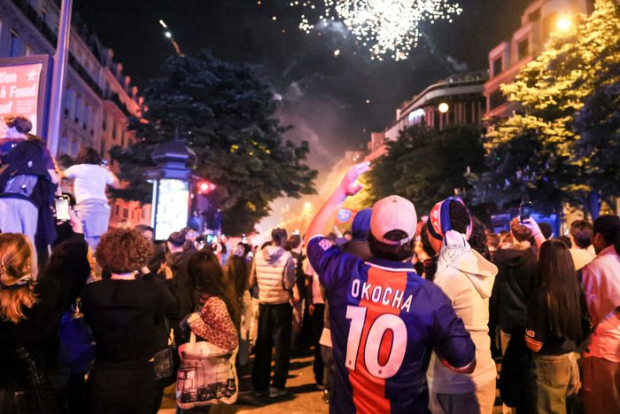 Riots break out in Paris after PSG's Champions League win | The Independent