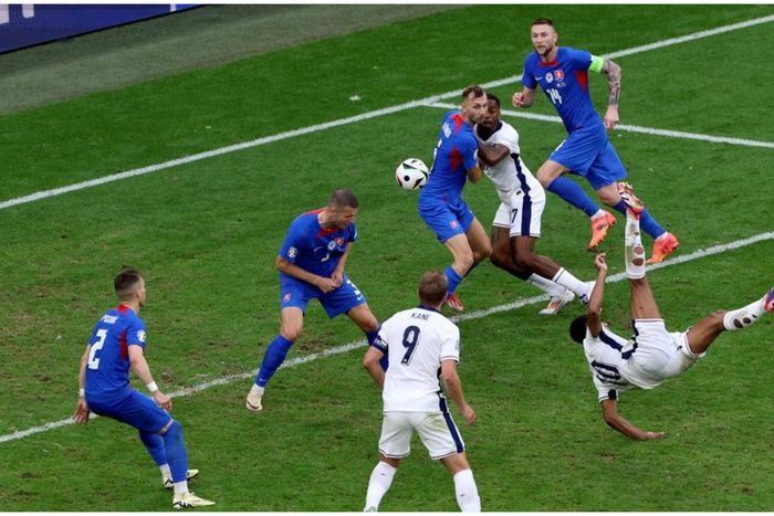 Jude Bellingham scores the all-important equaliser against Slovakia.