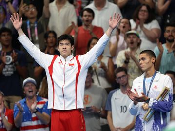 Paris 2024: China's Pan Zhanle breaks own world record to win men's 100m freestyle gold