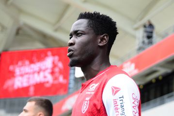 Harambee Stars defender Joseph Okumu watches from the bench as Reims move to fourth after big win