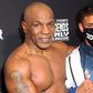 Mike Tyson beats up a plane passenger