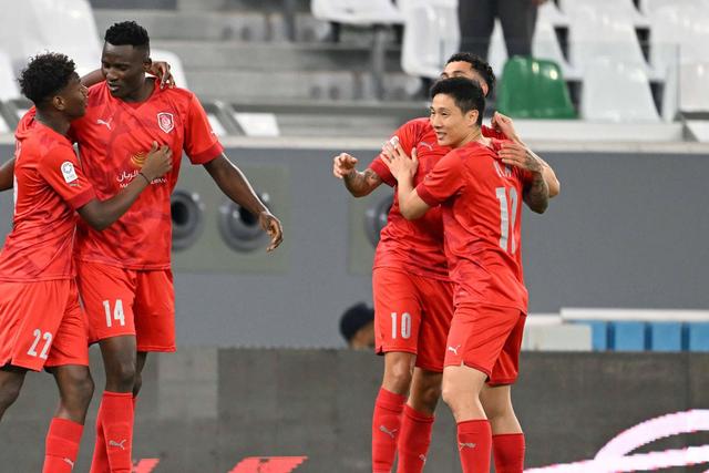 Michael Olunga celebrates goal with Al Duhail SC teammates.