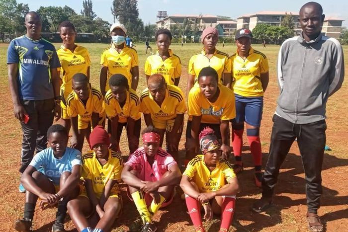 Undugu Queens FC players with their coaches