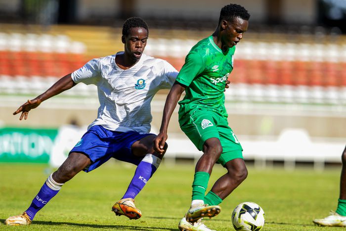 John Nyawir (right) of Gor Mahia Brian Aruda (left) of Kibera Soccer Academy