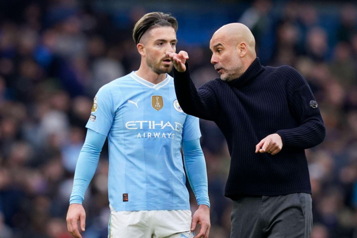Josep Guardiola coach of Manchester City instructs Jack Grealish of Manchester City after the final whistle during the Premier League match at the Etihad Stadium, Manchester. Picture credit: Andrew Yates / Sportimage