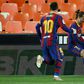 Messi double leads Barca to nail-biting win over Valencia