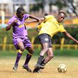 Wazito's Maxwell Odada challenges Mike Oduor of Tusker during their league encounter at the Ruaraka Stadium.
