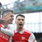 Bukayo Saka, Gabriel Martinelli and Granit Xhaka celebrate an Arsenal goal.