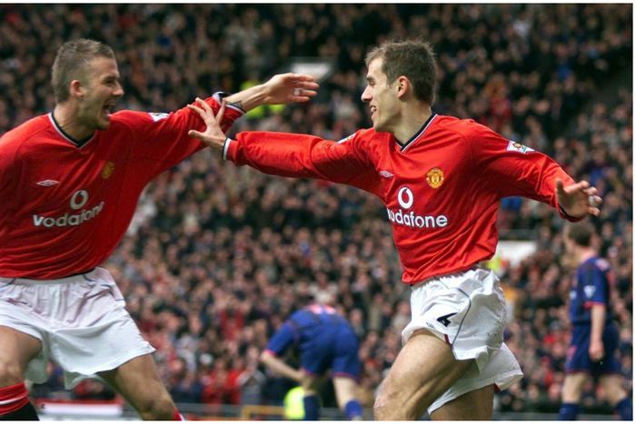 Beckham and Neville celebrate at Manchester United.