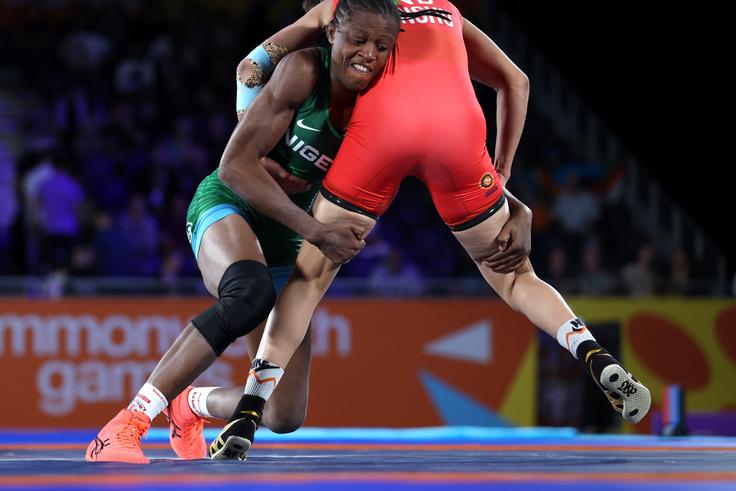 'I no fit dey practice new techniques still dey learn new anthem' - Nigerian Wrestler Adekuoroye