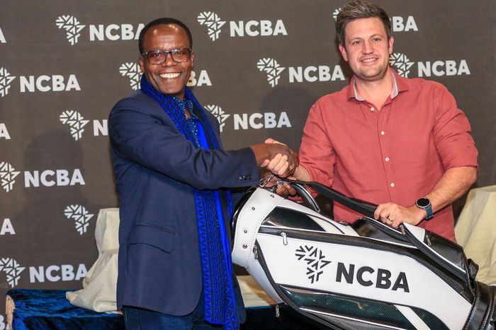 Wade Kilburn receives his award after winning the seventh leg of the NCBA Golf Series