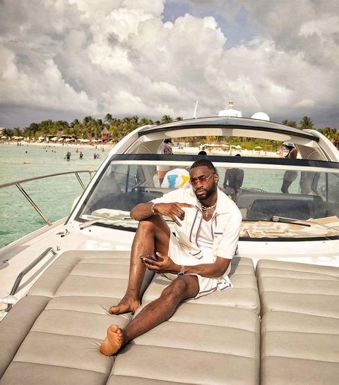 In the photos, Ajayi is seen in a relaxing mode, having a cocktail while wearing a beach outfit to pose on a yacht.