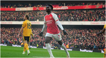 Arsenal survive Wolves late scare to stay top of Premier League