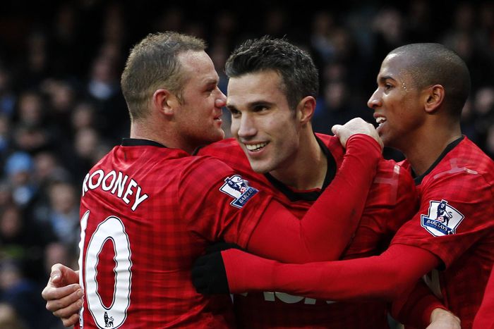 Ashley Young alongside Robin Van Persie and Wanye Rooney | Imago