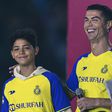Ronaldo and his son at his unveiling for AL-Nassr