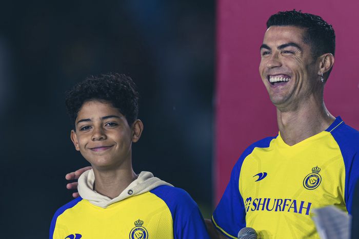Ronaldo and his son at his unveiling for AL-Nassr