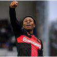 Nathan Tella celebrates for Leverkusen.