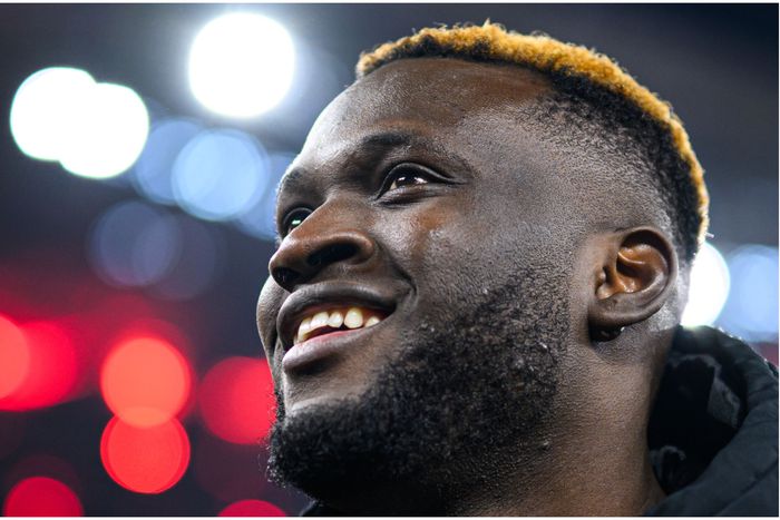 Victor Boniface smiles after his milestone moment for Leverkusen.