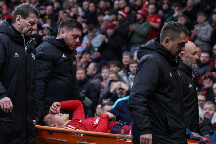 Manchester United v Crystal Palace, Premier League, Old Trafford, Manchester. Lisandro Martinez is stretchered off. || Image credit: Imago