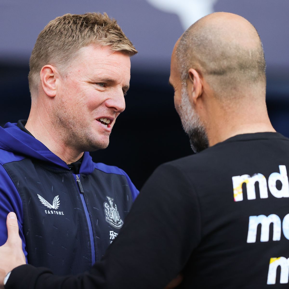 Man City boss Pep Guardiola with Newcastle manager Eddie Howe