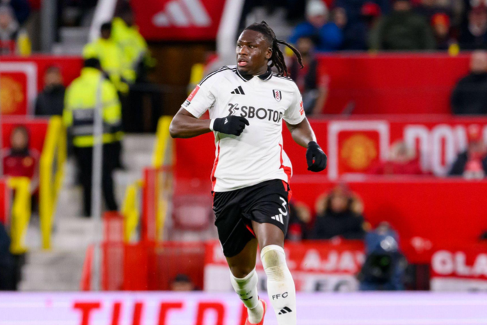 Calvin Bassey of Fulham FC runs with the ball during the Emirates FA Cup 2024 25 5th Round match between Manchester United, ManU FC and Fulham FC at Old Trafford on March 02, 2025 in Manchester, England. (Richard Callis SPP)