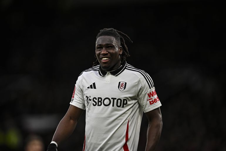 Calvin Bassey in action for Fulham against Manchester United