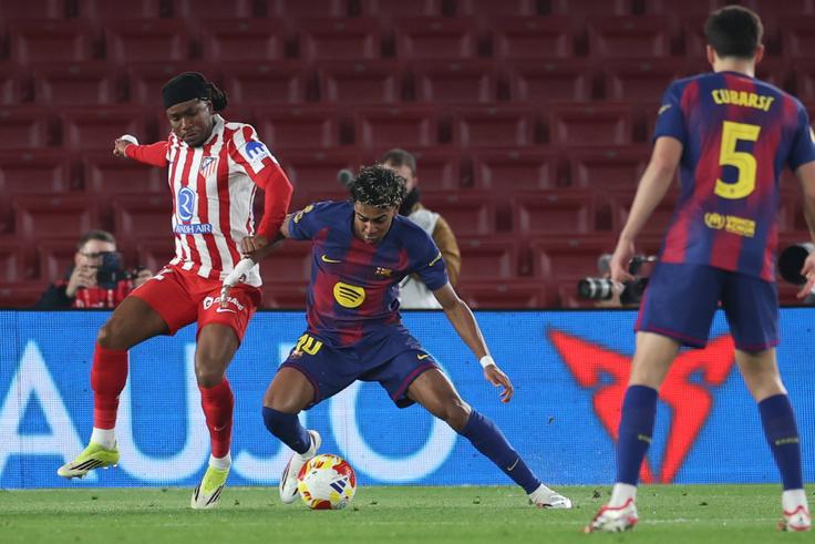 Atletico Madrid vs Barcelona in La Liga action