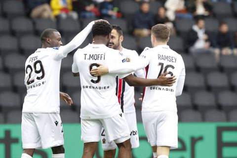 Terem Moffi celebrates with his teammates after opening the scoring for OGC Nice against Angers
