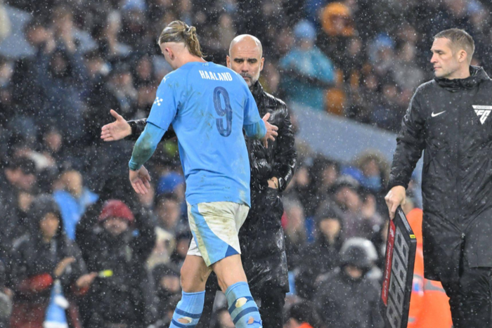 Pep Guardiola manager of Manchester City claps Erling Haaland of Manchester City hand as he is substituted || Image credit: Imago