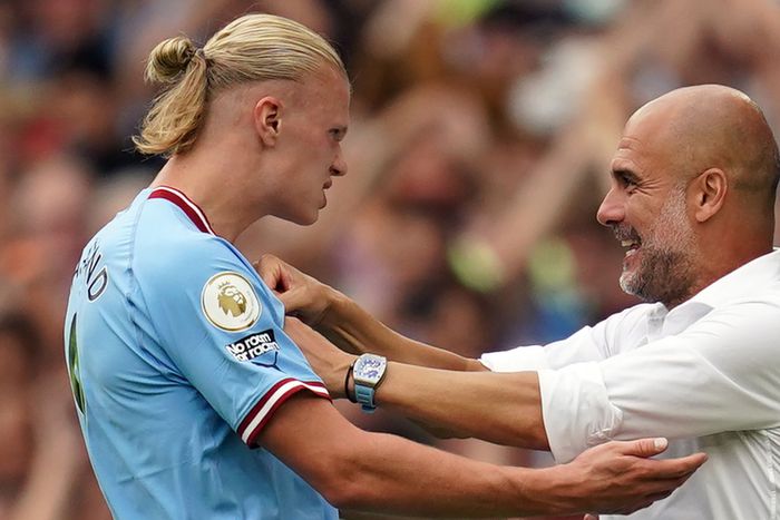 Manchester City boss Josep Guardiola with star striker Erling Haaland