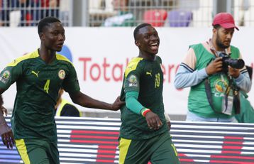 Rampant Senegal beat hosts Algeria to reach quarters