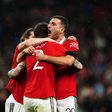 Manchester United players celebrating a goal