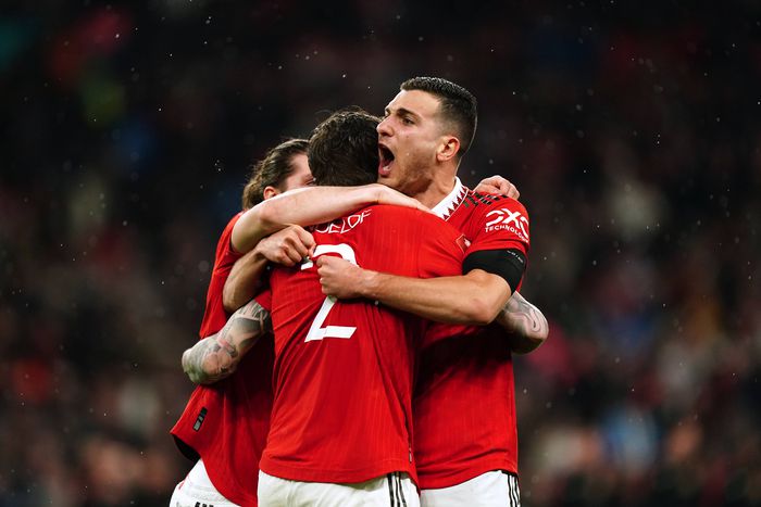 Manchester United players celebrating a goal
