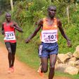 Patrick Kipngeno leads Titus Kimutai in a past mountain running race in Naivasha