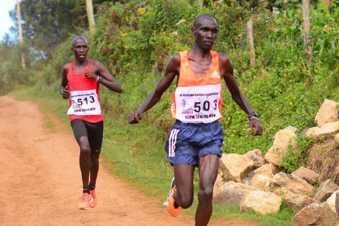Patrick Kipngeno leads Titus Kimutai in a past mountain running race in Naivasha