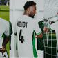 Super Eagles of Nigeria midfielder Wilfred Ndidi models new jersey ahead of South Africa World Cup qualifier.